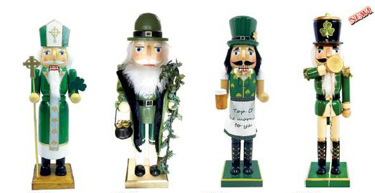 Two decorative nutcrackers dressed in festive green attire.